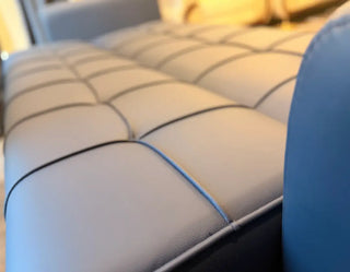 Modern Tufted Leatherette Sofa Cum Bed with Sleek Armrests