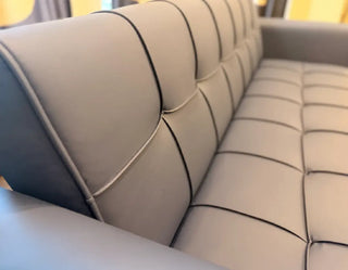 Modern Tufted Leatherette Sofa Cum Bed with Sleek Armrests