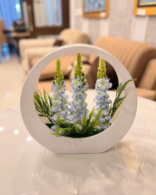 Artificial Blue Floral Arrangement in Geometric White Ring Pot