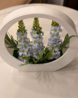 Artificial Blue Floral Arrangement in Geometric White Ring Pot